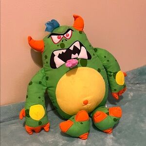 Vibrant Green Monster Plush with Orange and Yellow Details